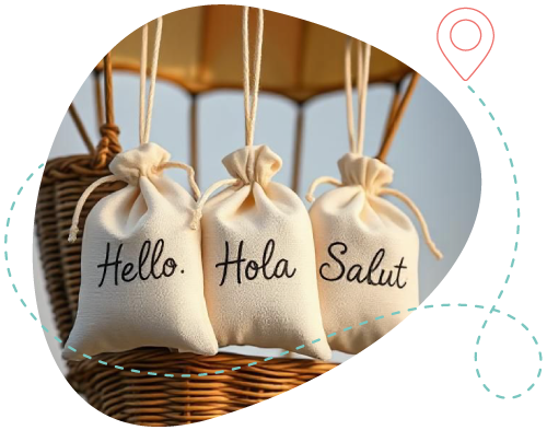 Tres sacos con saludos en varios idiomas colgando de un globo, simbolizando la terapia psicológica para hombres y mujeres migrantes.